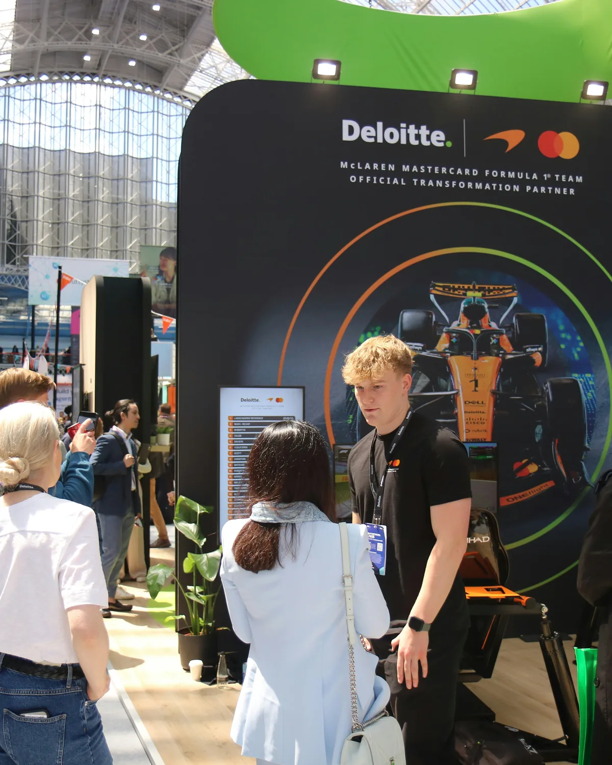 A fintech stand busy with delegates