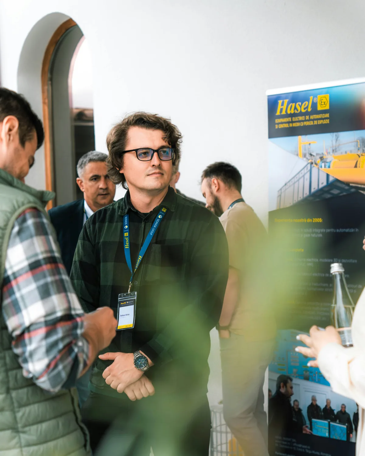 Delegates talking at a trade stand