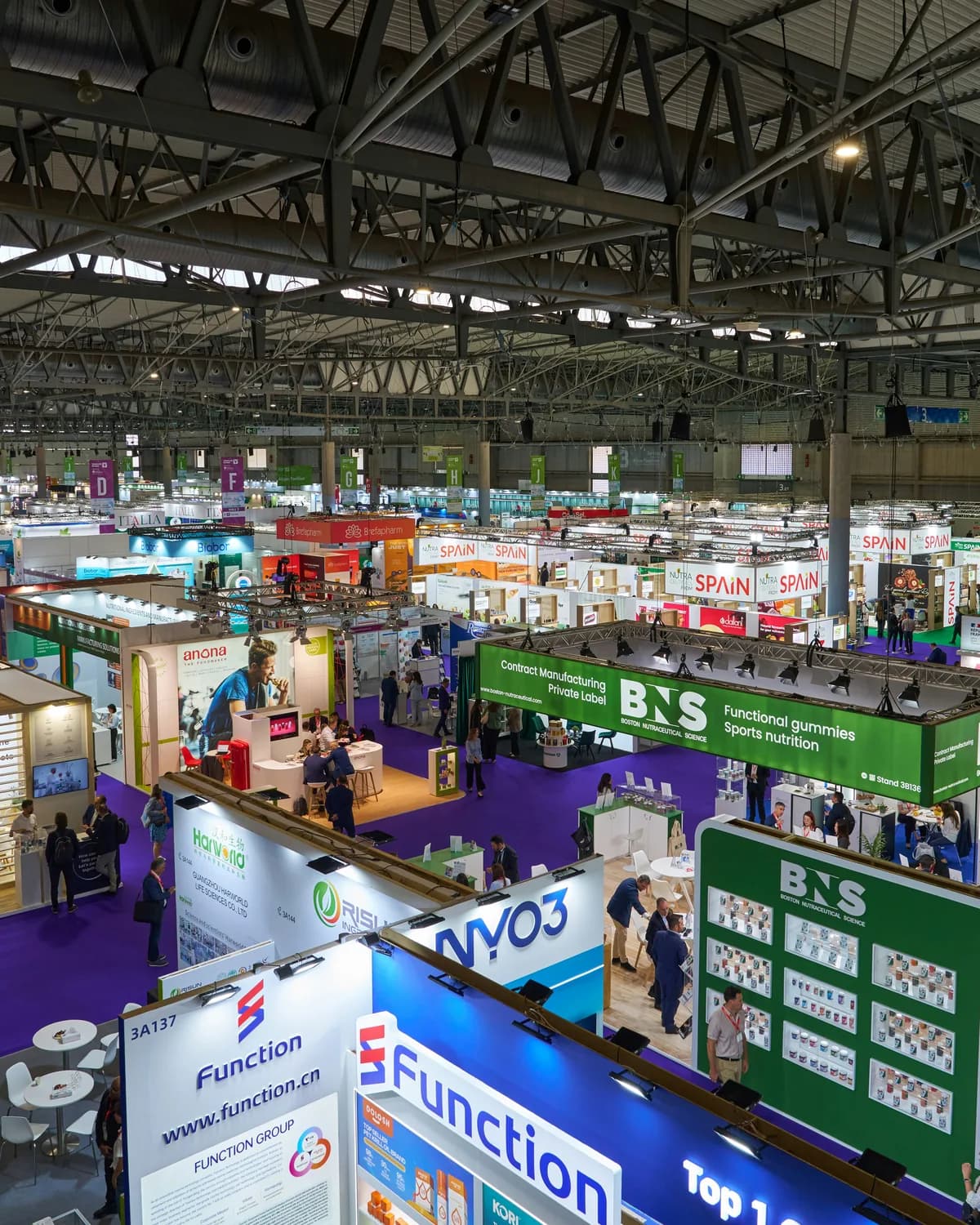 A trade hall of small business stands from above