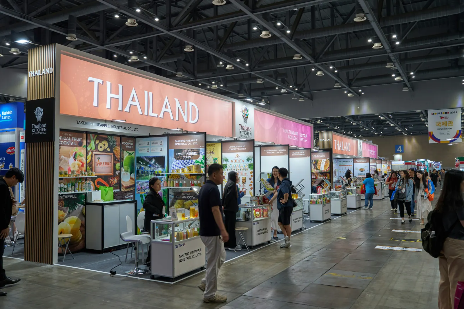 A Thailand tourism stand in an exhibition hall