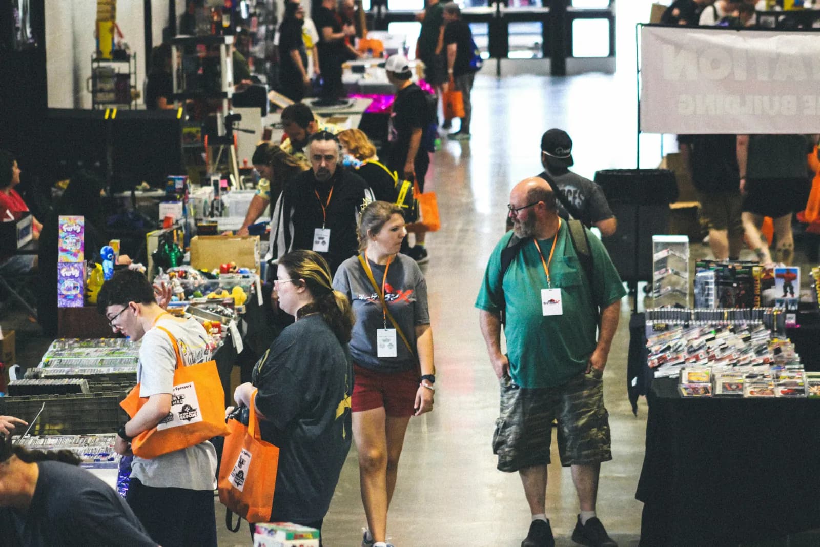 Attendees browsing gaming stalls